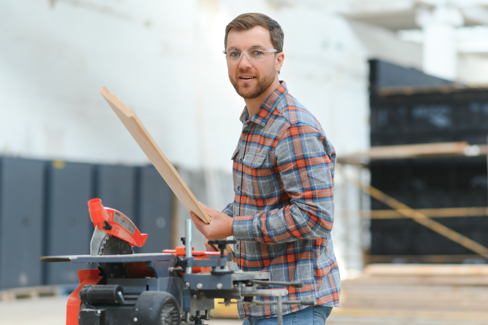 Man sole trader carpenter working and looking at the camera